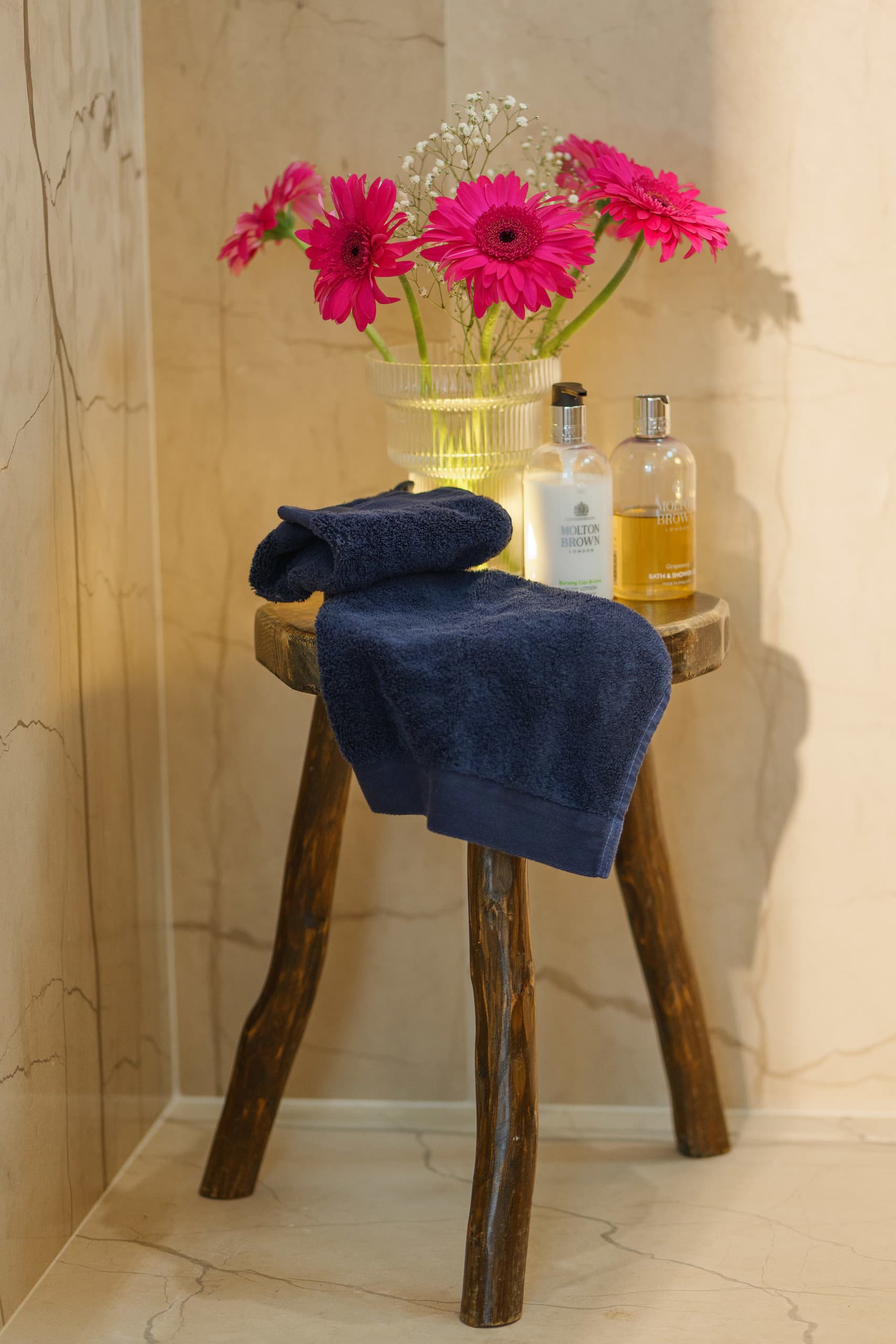 Nickel faucet from Officina Nicolazzi , hardware and sconces from Corston Architectural Design. Vintage rattan mirror.