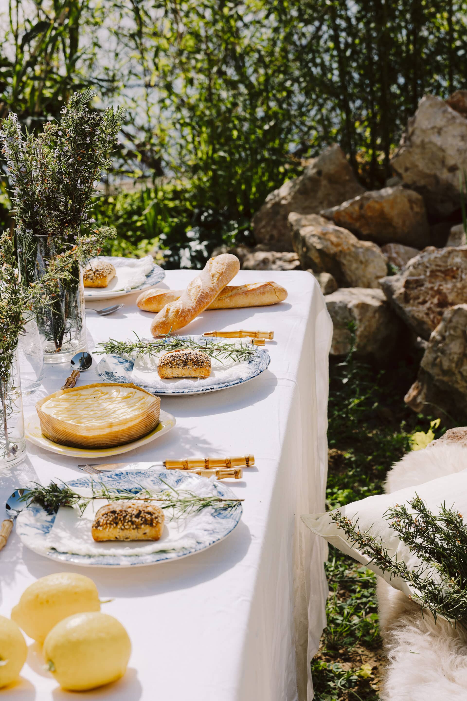 easter hosting at home -  outdoor garden table with linen and benches
